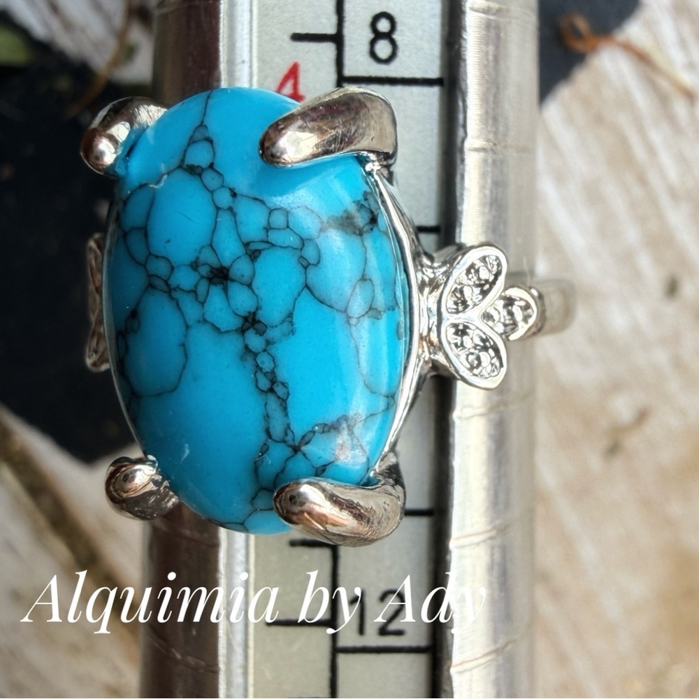 Turquoise western style silver ring